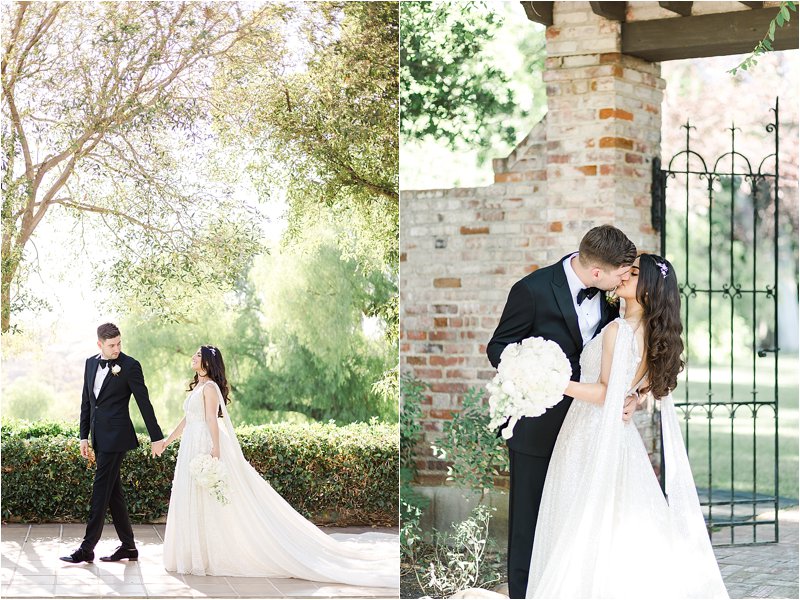 The Bride and Groom hold hands and walk through the courtyard at their Italian villa wedding.