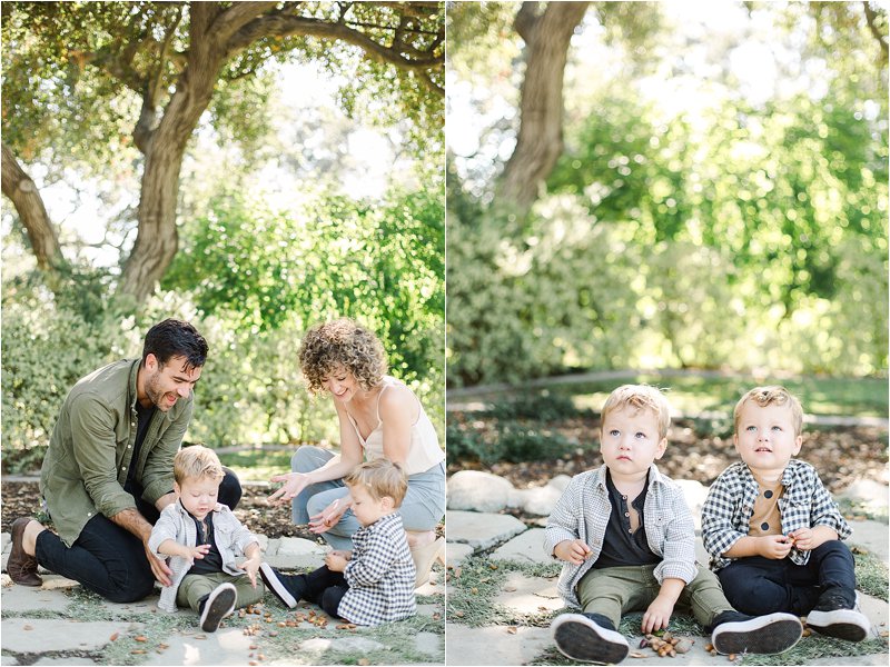 Candid family photos - image on the left shows parents squating down and playing with their twin sons.  Image on the right shows the twins sitting next to each other wearing adorable fall family photo outfits during their family portrait session in Pasadena, CA.