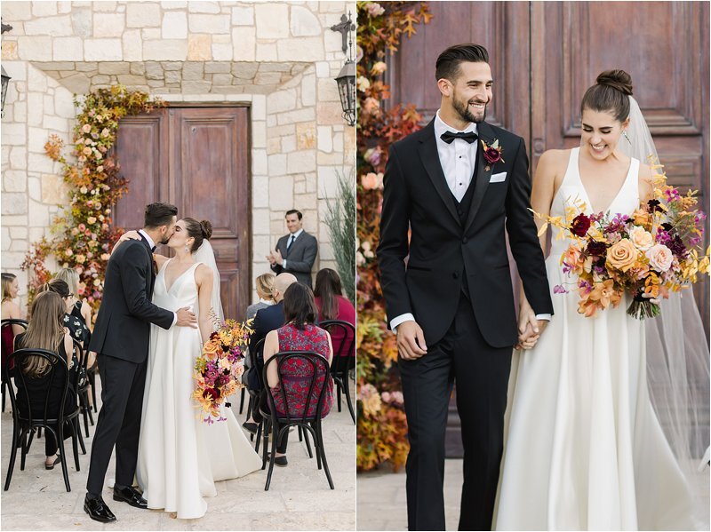 Bride and Groom share their first kiss as they exit their micro-wedding in front of a stone chapel in Paso Robles.  They chose a vibrant fall color scheme when deciding how to choose the perfect wedding color scheme which is showcased in her bridal bouquet and their ceremony florals.