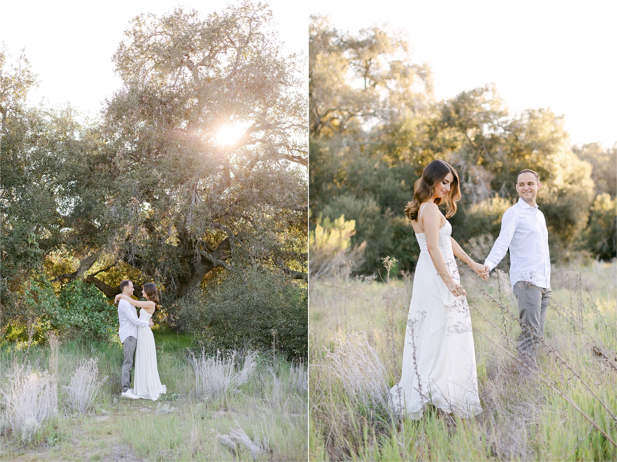 Man wearing white button down and grey pants, holds his fiance's hand and leads her Thomas Riley Wilderness Park during thier Orange County engagement photos