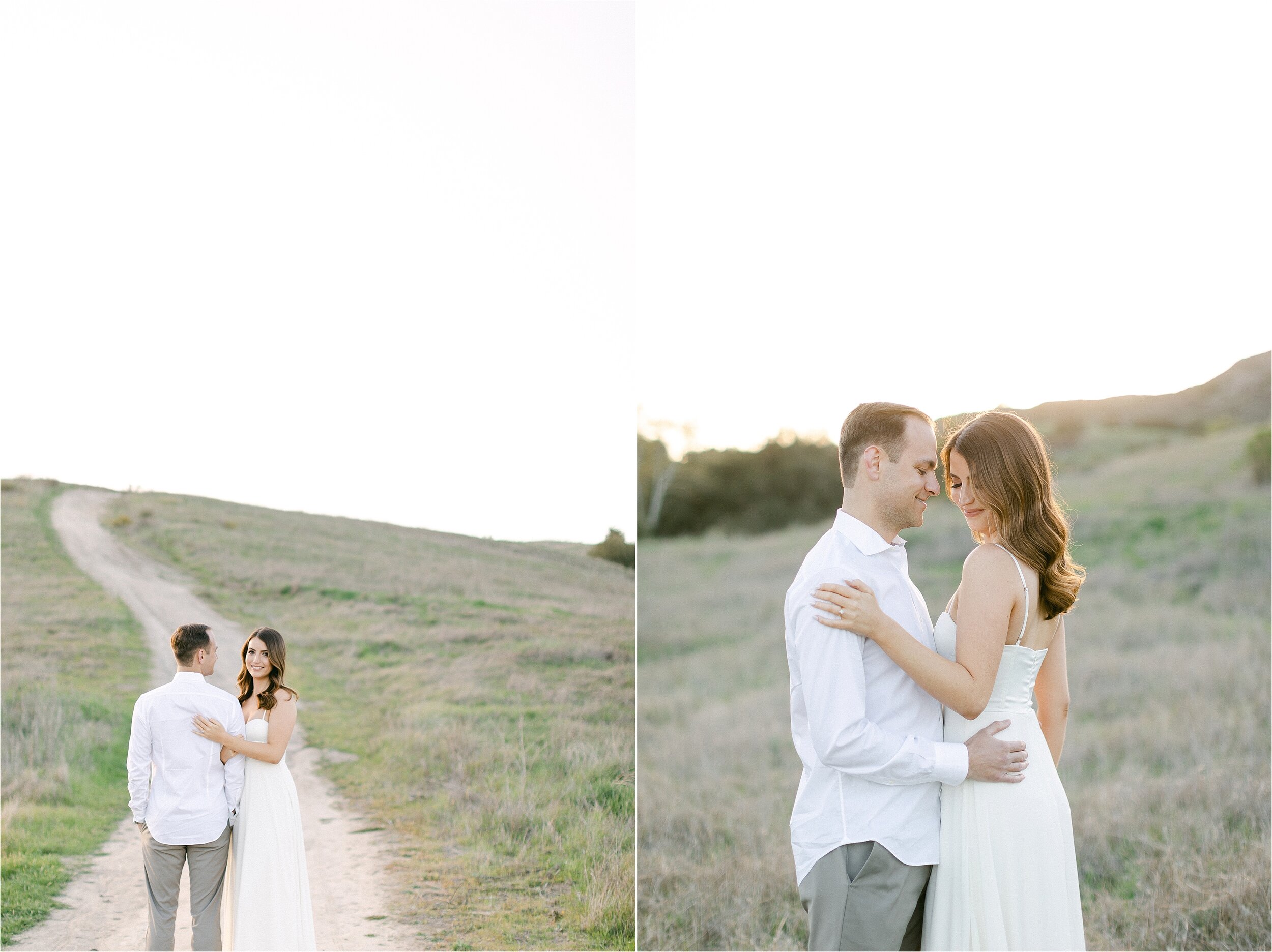 Male smiles at his bride-to-be during their hillside engagement photography session in Orange County, CA.