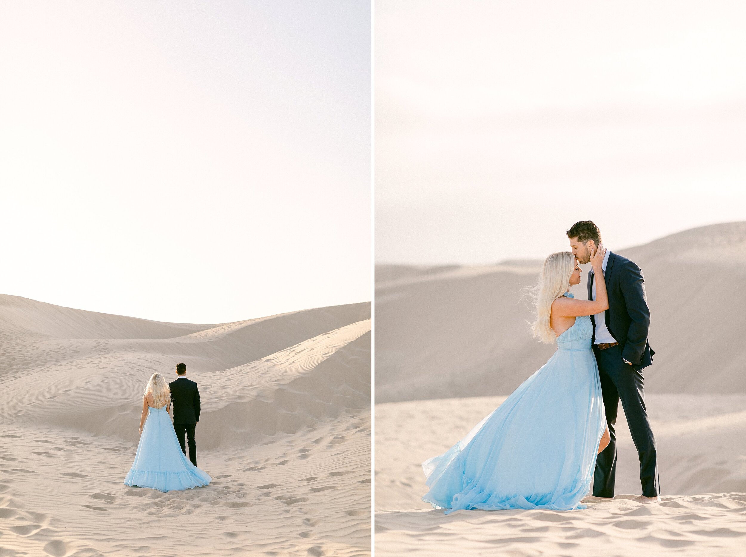 blonde female in powder blue gown and brunette male in navy blue suit hold hands and walk off into the sunset while taking engagement photos at the sand dunes