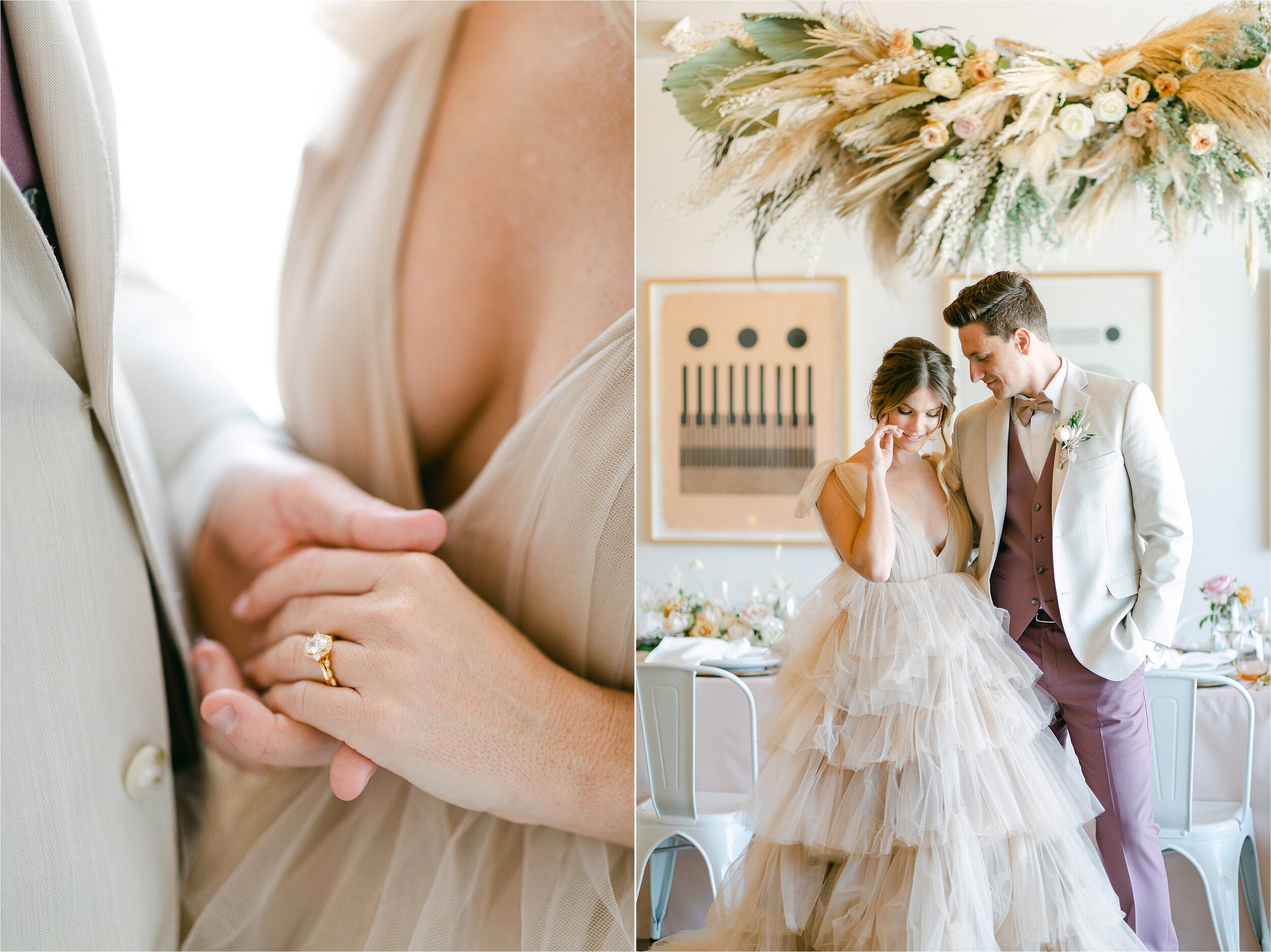 Nude colored micro wedding featuring a hanging floral feature over the reception table with both live and dried florals.  The bride and groom are standing in front of the table.  She is wearing a nude colored, layered tulle ball gown and he is wearing brown pants, vest and bow tie with a cream suit jacket
