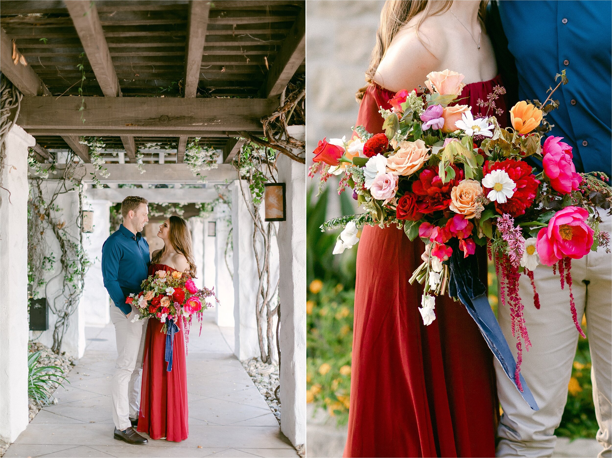 Vibrant spring bouquet held by a brunette woman in a wine colored dress looking lovingly at her fiance, a tall male in a midnight blue button down shirt and khaki pants.