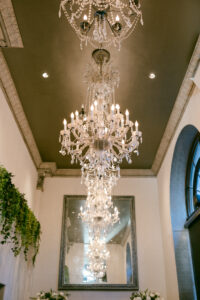 Detail photo of chandelier in the ceremony space at the Culver Hotel.