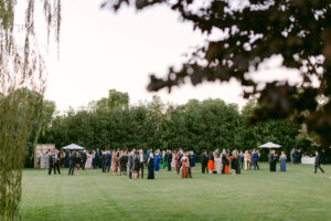 Horizontal wide shot of the cocktail hour lawn.