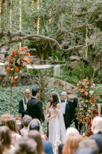 Stunning fall wedding ceremony under the oak trees at Calamigos Ranch in Malibu, CA.