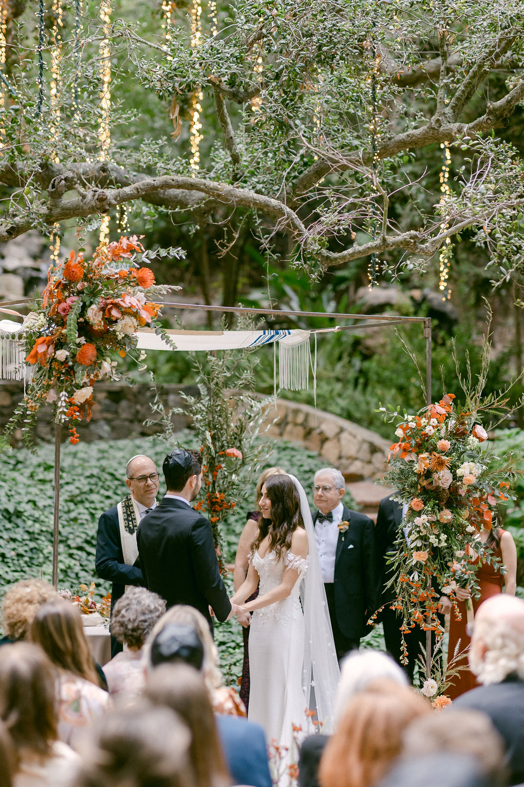 Fall wedding ceremony under the oak trees at Calamigos Ranch in Malibu, CA.