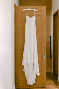 Suzanne Neville bridal gown hanging in bridal suite