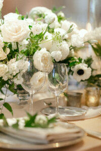 Reception detail photo of the stunning white floral centerpieces.