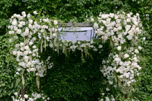 Close up of white floral chuppah with cascading greenery at the Four Seasons Beverly Hills.