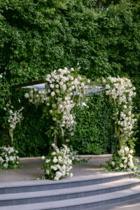 White rose chuppah at the Four Seasons Beverly Hills. Created by Lilla Bello and photographed by SoCal wedding photographer Tiffany J Photography.