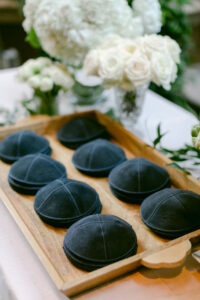 Detail photo of kippah's prior to the wedding ceremony at the Four Seasons Beverly Hills.